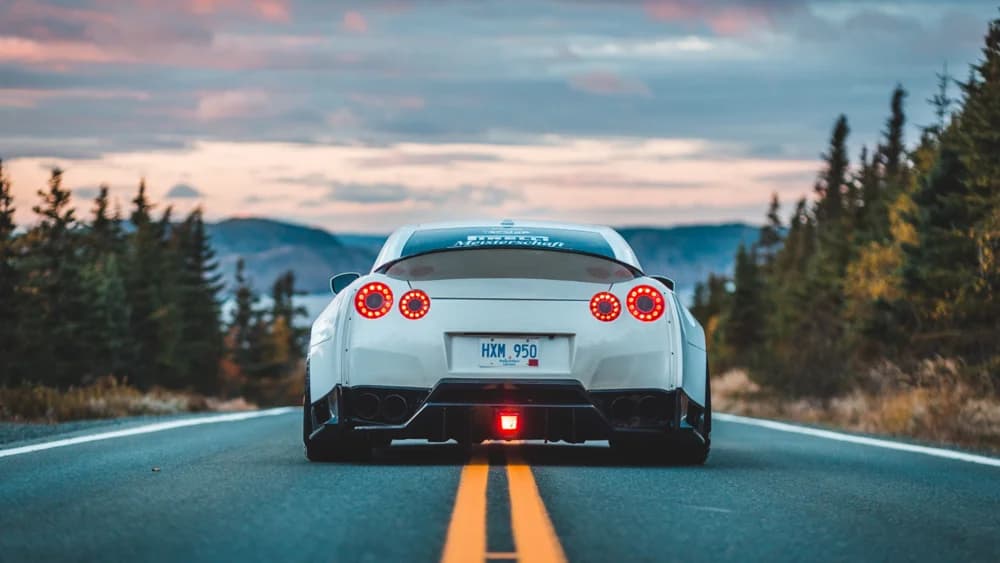 Car on a road at dusk